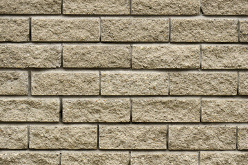 Obraz premium Modern brickwork exterior with textured cement blocks