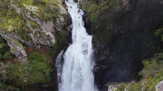 Waterfall Cascading Down On Cliffs In Quint&aacute;s, Silleda, Spain - Drone Shot