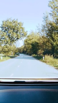 Car POV drive on countryside road dashboard view 