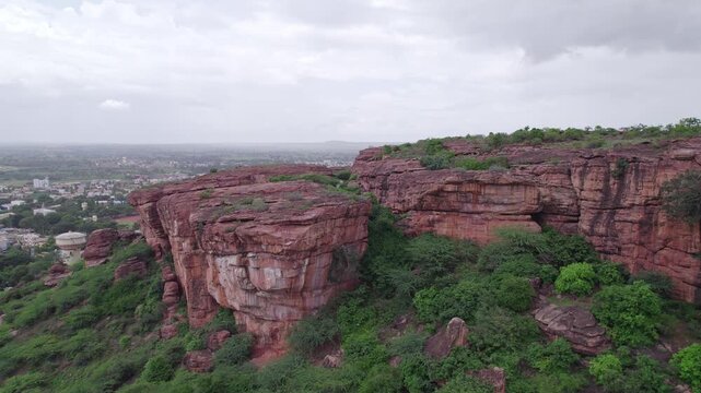 Top view of Badami Caves with rocky formations and natural terrain under open sky