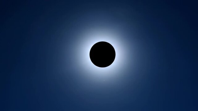 A stunning celestial event featuring a full solar eclipse with a dark moon