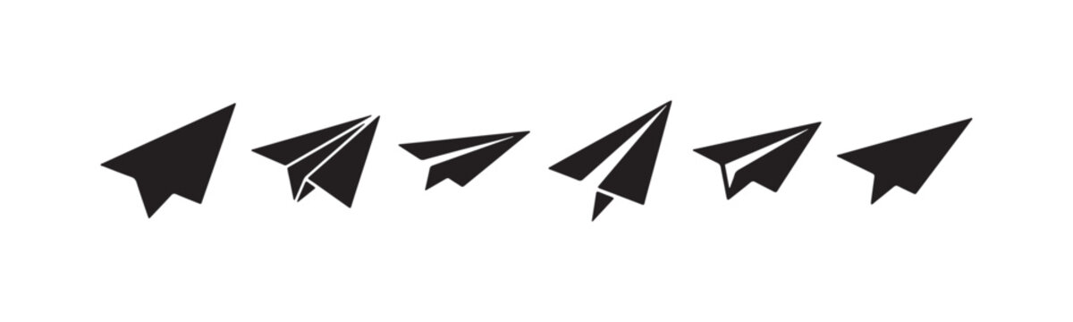 Collection of six solid black paper airplane silhouettes, featuring varied geometric styles and angles for modern communication and travel icons.
