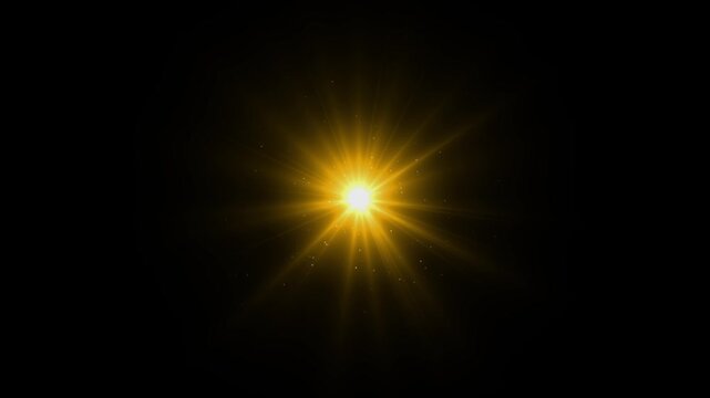 Luxury golden glitter dust explosion with shimmering light flare, cinematic sun light rays, sparkling lens flare, slow motion bokeh particles on black background for holiday social media animation 4K