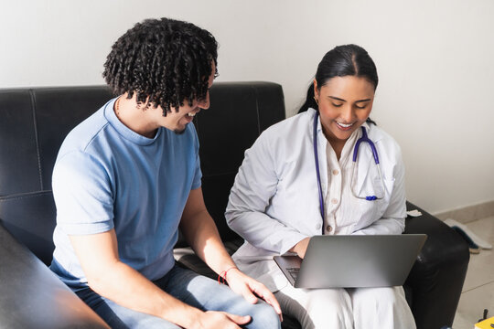 Doctor and patient having online medical consultation