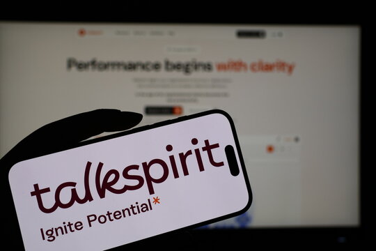 Kiel, Germany - 05-20-2026: Smartphone displaying French collaboration software company Talkspirit logo in front of companys webpage