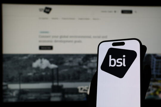 Kiel, Germany - 05-20-2026: Smartphone displaying British standards organization BSI logo in front of companys webpage