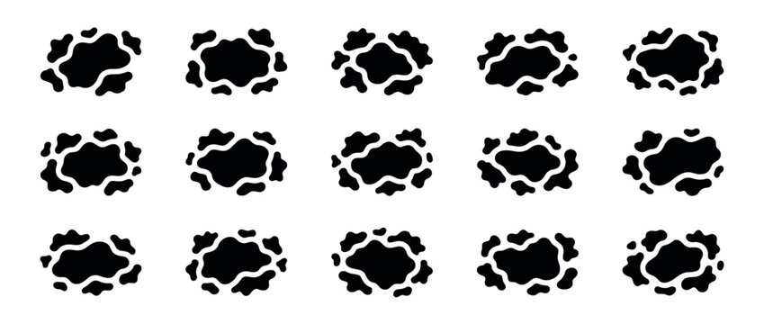 Collection of fifteen black organic blotch shapes resembling cow spots, a minimalist graphic icon set of abstract, irregular forms arranged in a simple grid for creative design