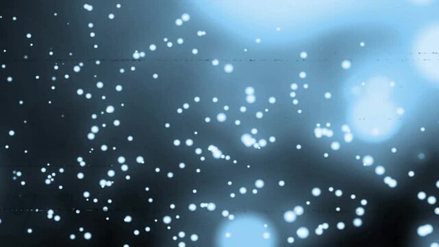 Glitch signal appearing and bands shifting into bokeh while specks rising creating ambient loop