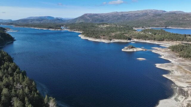 Storavatnet reservoir on Osteroy Norway showing regulated water storage for hydropower