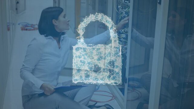 Female IT tech with clipboard, reacting to pulsing padlock, reaching into rack, securing network