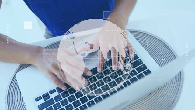 Woman typing laptop on woven placemat starting rotating globe and HUD over keyboard for tech study