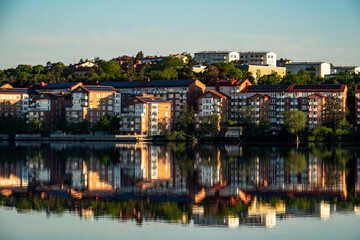 Fototapeta premium Stockholm, Sweden A sunrise view over Lake Malaren of the Alvik district.