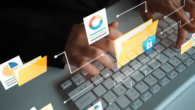 Hands typing on a keyboard surrounded by digital folders and icons representing data management, security, and technology in a modern office environment Gluon.