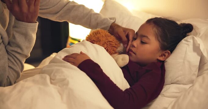 Night, dad and hand with sick child in bed for telehealth, advice or monitoring fever in home. Father, talking or checking kid with phone call or assistance for childcare, illness or virus in bedroom