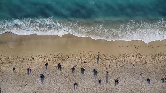 Top down drone view of the coastline at Cleopatra Beach, Turkey summer vacation