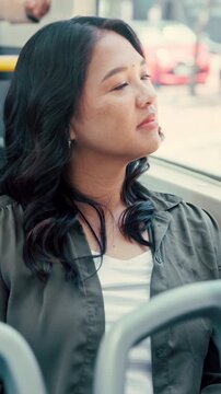 Businesswoman, thinking and commute by bus window with work destination, travel or real estate career. Realtor, person and morning journey in public transport with thoughts, plan or vision for future