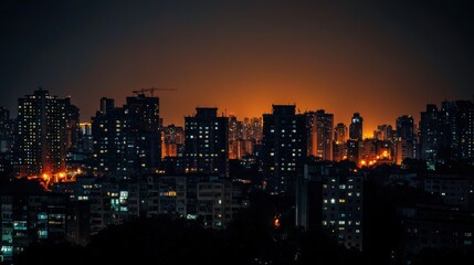 Obraz premium City buildings cast in darkness during a widespread power blackout