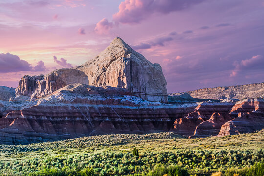 sunset in the mountains, Rolling clouds and the evening sun shine gold on Page, AZ, USA 