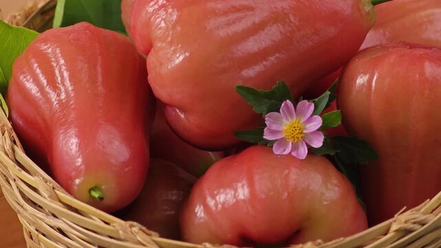 Red rose apple on basket