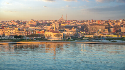 Obraz premium Sunset panorama view with the Bosphorus Great Mosques Harbour and another famous landmarks in the European and Asian parts of Istanbul Turkey