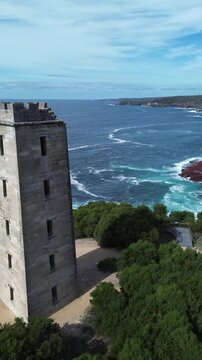 Boyd Tower, New South Wales, Australia &ndash; Vertical Aerial Reveal of Rugged Coastline and Ocean Cliffs