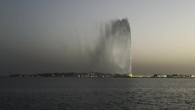 King Fahd Fountain at dusk with beautiful sunset sky over the Red Sea, Jeddah, Saudi Arabia