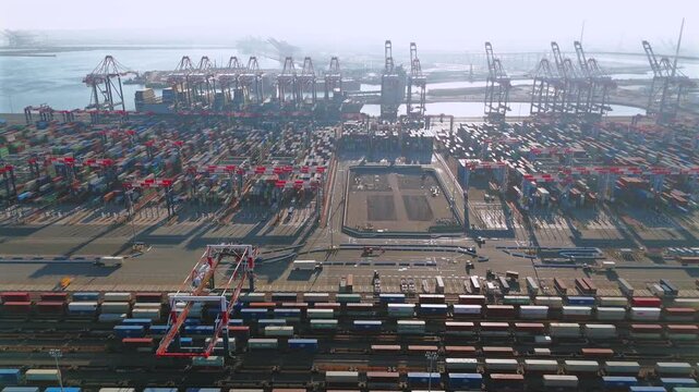 Drone view of freight rail yards and gantry cranes at Long Beach port