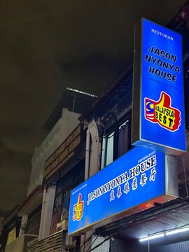 Vintage neon sign of Jason Nyony House in George Town on Penang, Malaysia