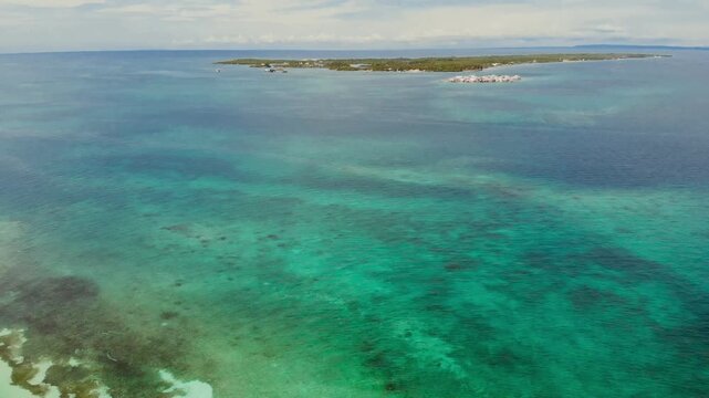 Drone ascending and rotating shot revealing san bernardo islands archipelago: Mucura, Tintipan and Santa Cruz