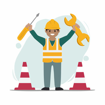 Construction worker holding tools and wearing safety gear