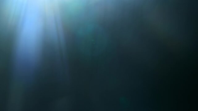 Real Cinematic Lens Flare Overlay on Black Background at 1000fps Slow Motion.