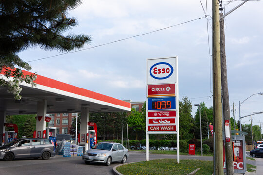 Toronto, Canada - May 19, 2026: Esso gas station with Circle K and Tim Hortons signage