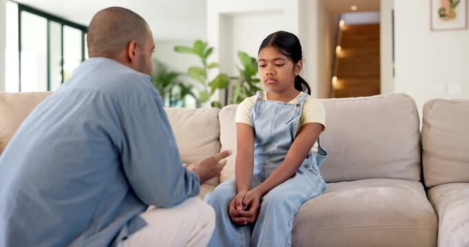 Father, child and serious discussion on sofa for bad behavior, guidance and listen to lecture. Lesson, dad and reprimand sad girl kid in home for attitude problem, teaching manners and explain rules