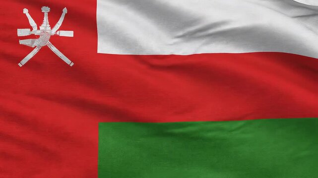 Oman national flag waving in the wind with traditional emblem