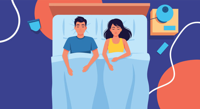 Peaceful scene of a young couple sleeping comfortably together in a large bed under blankets in a dark blue room at night.