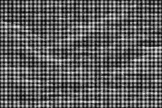 The crumpled texture of a gray surface fills the entire frame.