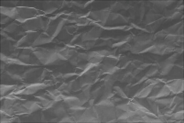 Fototapeta premium A close-up view of crumpled gray paper texture fills the frame.
