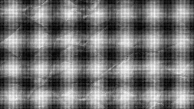 A close-up view of a crumpled gray paper texture fills the entire frame