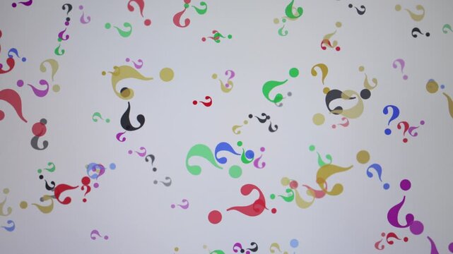 Colorful question marks float randomly across a computer monitor, representing uncertainty, inquiry, and conceptual thinking.