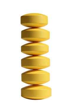 Yellow Round Tablets Stacked in Delicate Vertical Balance Isolated on Transparent Background PNG
