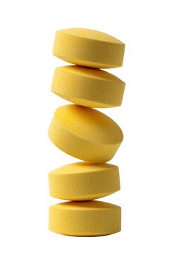 Yellow Round Tablets Stacked in Delicate Vertical Balance Isolated on Transparent Background PNG