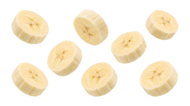 Fresh ripe banana slices floating isolated on white background for healthy diet and tropical fruit culinary concepts in high resolution studio photography shots