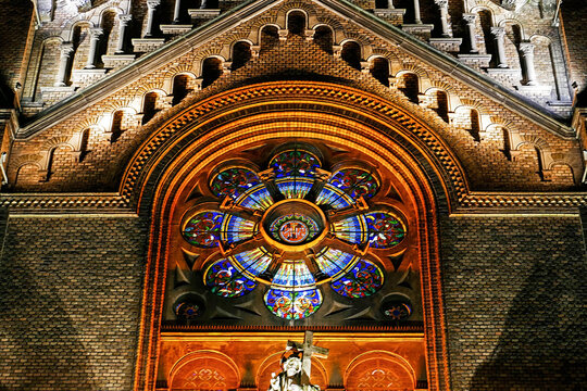 Various night lighting of the Roman-Catholic Cathedral Millenium located in Traian Square, Timisoara, Romania. Detail.
