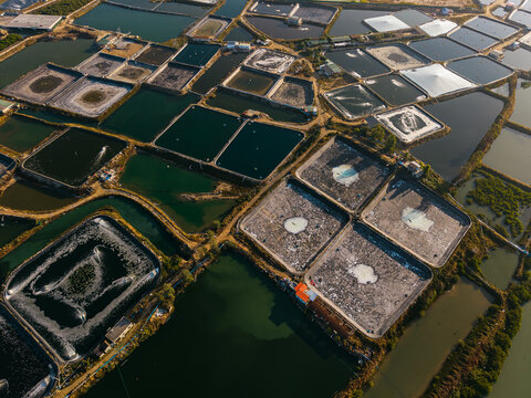 Aerial top view of traditional salt mining fields industry in China
