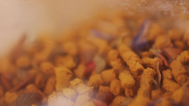 Aromatic buckwheat tea, granules and lemon on wooden table, flat lay close up macro. 
