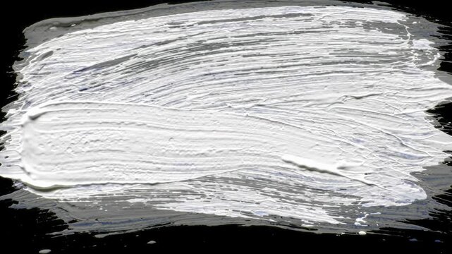 Vibrant, thick white impasto paint brush strokes, highly textured and fluid, dynamically sweep across a deep black void in a clean wipe transition, versatile abstract motion graphic