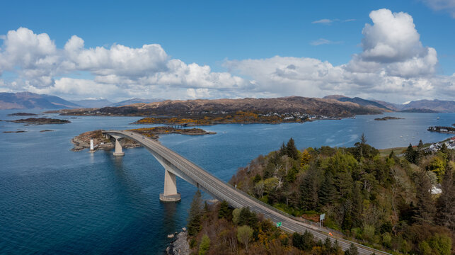 Skye Bridge on the Isle of Skye in Scotland, UK, aerial view of the iconic bridge crossing the sea loch with dramatic Highland landscape and coastal scenery.
