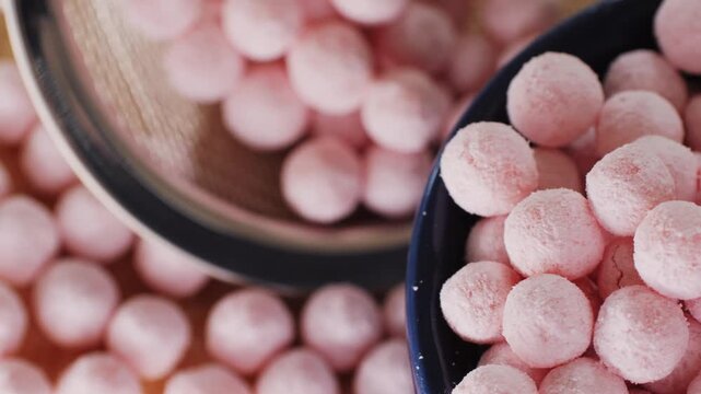 Organic tapioca pearls close-up in a bowl on a wooden table, asian dessert dish, chinese traditional drink, dry pearl.