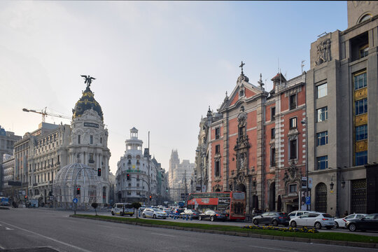 Gran Via and Metropolis Building in Madrid Spain at Sunset