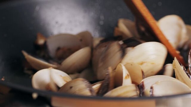 Marinara mussels with garlic, sauce, lemon and parsley. Classic spanish and French meal macro close up.